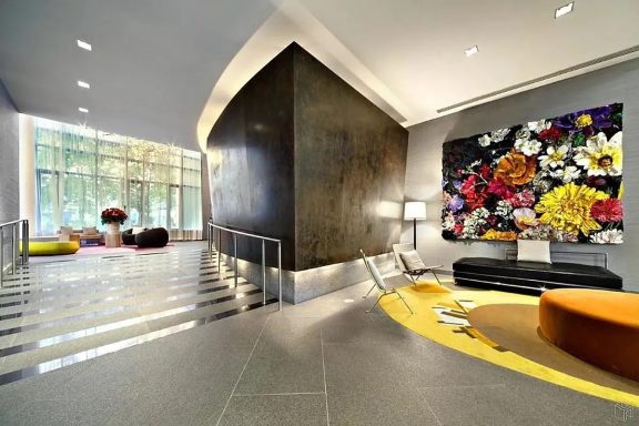 Nice lobby Modern lobby featuring colorful artwork, sleek furnishings, and large windows.